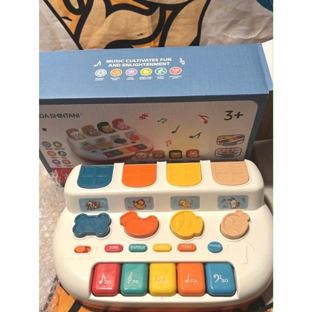 Interactive Pop‑Up Animal Musical Toy – Lights, Music, Piano Keys – Ages 3+